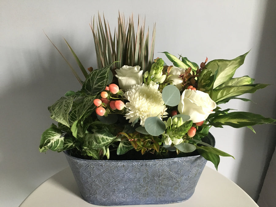Planter with fresh flowers